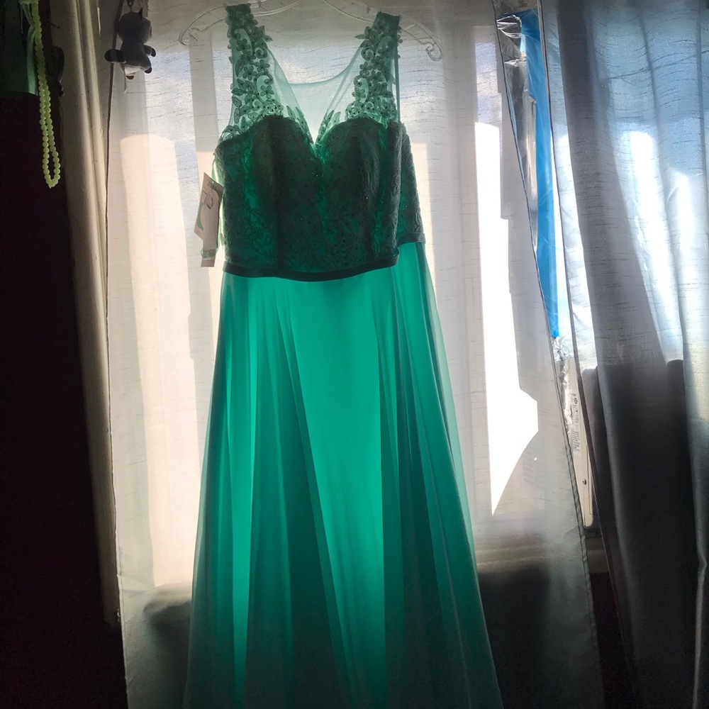 Light blue/aqua dress brand new with tang With tag still on it